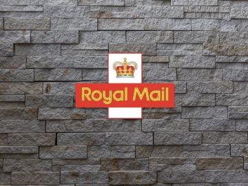 Royal Mail logo on brick wall