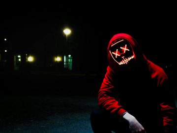 Hacker in purge outfit