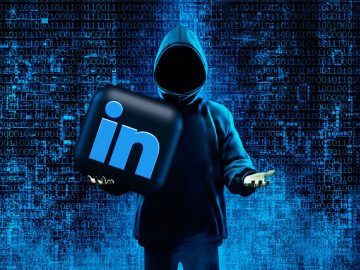 Hacker holding Linkedin logo