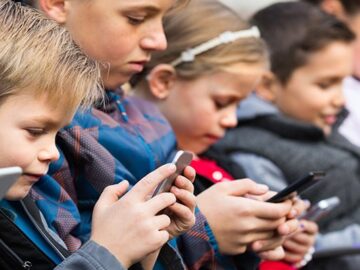 Schools go smartphone-free to address online harms