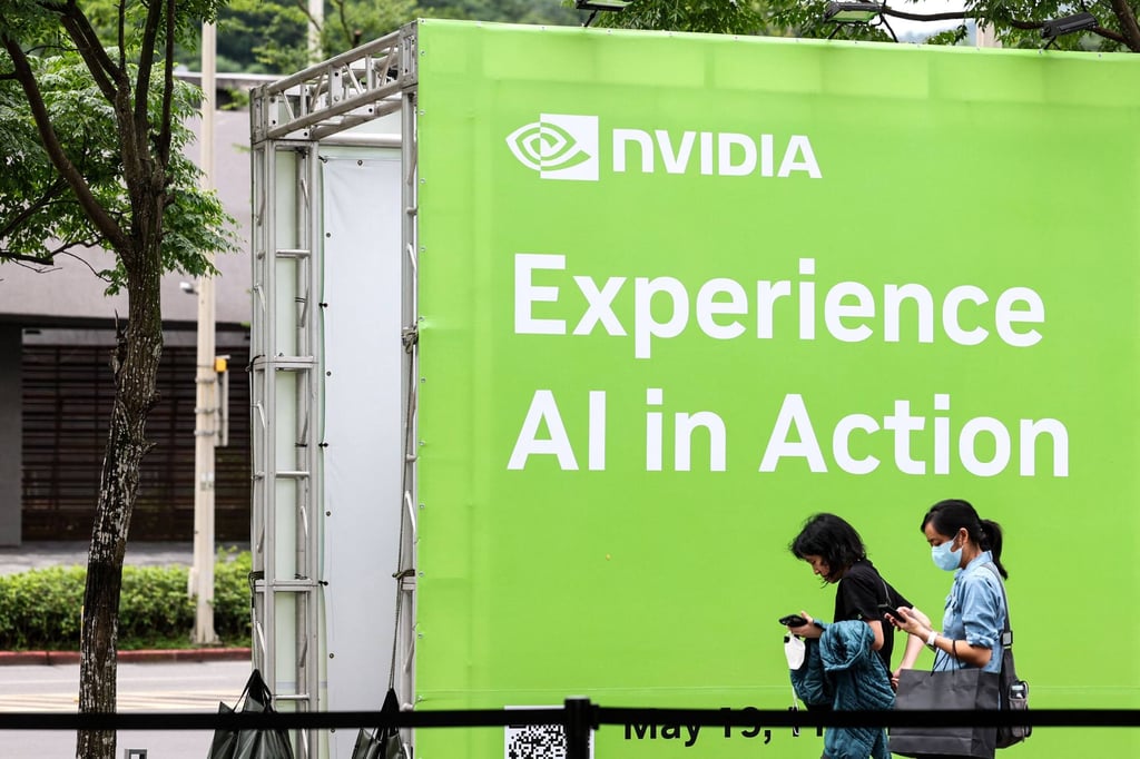 Chinese semiconductor, AI firms form pact as Nvidia faces inquiry on H20 chip’s security People walk past an Nvidia display advertisement in Taipei during the Computex 2025 trade show on May 19, 2025. Photo: AFP