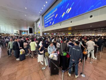Travellers wait at Brussels airport following the cyberattack, in Brussels, Belgium on September 20. Photo: Reuters